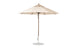A 9 beige Essential Fiberglass Umbrella with a sturdy metal pole and base stands against a plain white background. Open, it reveals radial ribs and a central finial, crafted by Ledge Lounger using marine-grade fabrics for lasting durability.