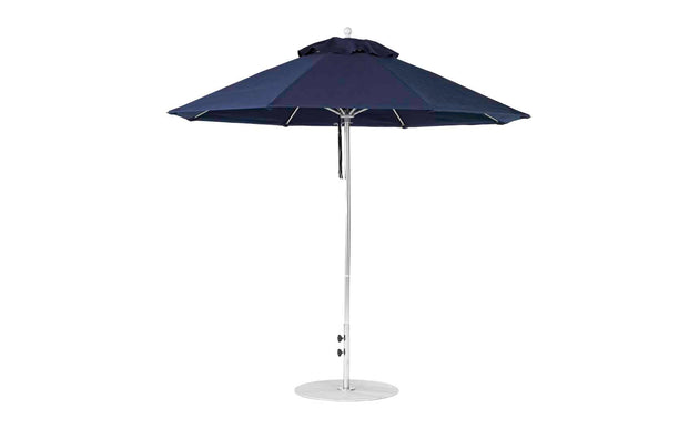 The Essential Fiberglass Umbrella by Ledge Lounger is a 9 octagon pulley model seen on a white background. Designed with marine-grade fabric, it features a silver pole and round base, providing ideal shade for gardens or patios.