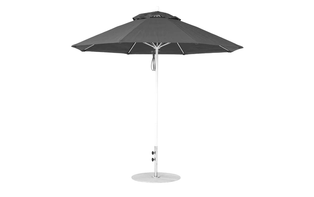 The Ledge Loungers Essential Fiberglass Umbrella - 9 Octagon Pulley boasts a marine-grade black canopy, sleek silver pole, and sturdy round base, offering perfect shade for your garden or patio.