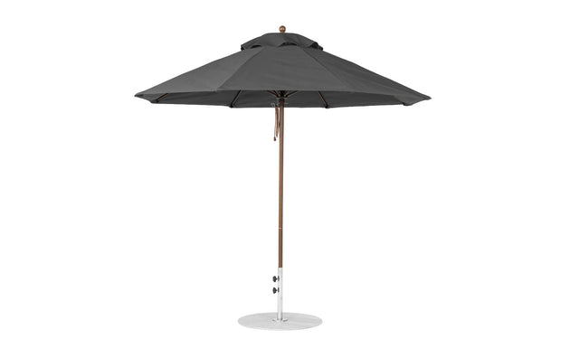 The Ledge Lounger Essential Fiberglass Umbrella, in dark gray with a wooden pole and round metal base, features marine-grade fabrics. When fully open, its 9 octagon canopy offers expansive shade.