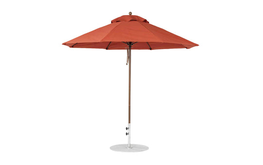The Ledge Lounger Essential Fiberglass Umbrella - 9 Octagon Pulley with a sleek metal pole and circular base stands open, showcasing its brown, pointed top. Crafted from marine-grade fabrics, it provides reliable shade and ensures sturdiness and weather resistance for long-lasting use.