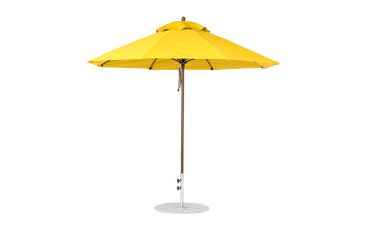 A vibrant yellow Essential Fiberglass Umbrella - 9 Octagon Pulley by Ledge Lounger features a metal pole and base, displaying a wide marine-grade fabric canopy for optimal shade.