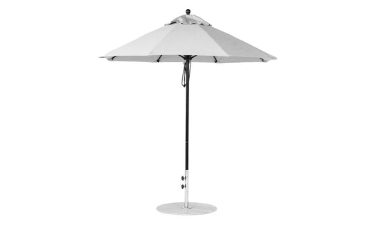 The Essential Fiberglass Umbrella by Ledge Lounger features a sturdy black pole and circular base, with a 7.5 octagon canopy in gray crafted from marine-grade fabric, offering wind resistance for outdoor use.