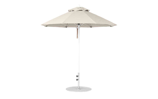 The Ledge Lounger Essential Fiberglass Umbrella features a 7.5 octagon canopy in beige, made from marine-grade fabric with wind-resistant properties and a sturdy metal pole. It includes a crank for angle adjustments and stands on a circular base.