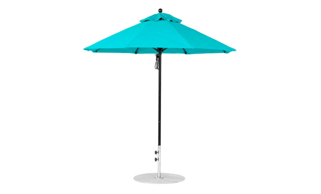 The Essential Fiberglass Umbrella - 7.5 Octagon Pulley by Ledge Lounger features a turquoise design with a black pole and round metal base, triangular peak, and modern look. Made from marine-grade fabrics, it offers wind-resistant shade to enhance outdoor spaces.