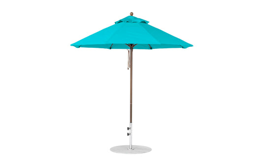 The Ledge Lounger Essential Fiberglass Umbrella - 7.5 Octagon Pulley features a blue canopy with eight marine-grade, wind-resistant sections on a silver pole and round base.
