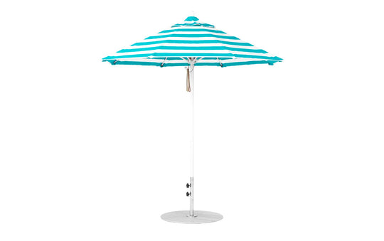 The Essential Fiberglass Umbrella - 7.5 Octagon Pulley by Ledge Lounger features a turquoise and white striped canopy made of marine-grade fabrics and a sturdy metal pole. Its wind-resistant design and round base ensure stability against any seaside breeze, standing open against a plain white background.