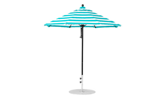 The Essential Fiberglass Umbrella by Ledge Lounger features a teal and white striped marine-grade fabric canopy atop a black pole with a silver base. This wind-resistant 7.5 octagon pulley umbrella is shown fully open against a plain white background.