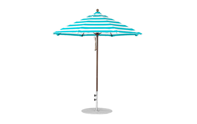 The Ledge Lounger Essential Fiberglass Umbrella features a 7.5 octagon canopy in teal and white stripes, crafted from marine-grade fabric with a slim metal pole and sturdy circular base for wind-resistant shade on any patio.