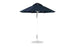 The Ledge Lounger Essential Fiberglass Umbrella - 7.5 Octagon Pulley is a blue patio umbrella with a metal pole and round base, featuring a classic wide canopy from marine-grade fabrics and a vented top for air circulation, enhancing its wind resistance.
