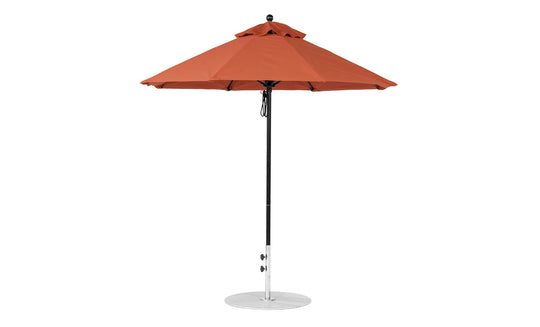 The Ledge Lounger Essential Fiberglass Umbrella features a 7.5 octagon burnt orange canopy on a black pole. Its marine-grade fabric and classic conical design are supported by a round silver base, offering wind resistance and perfect shade for patios or gardens.