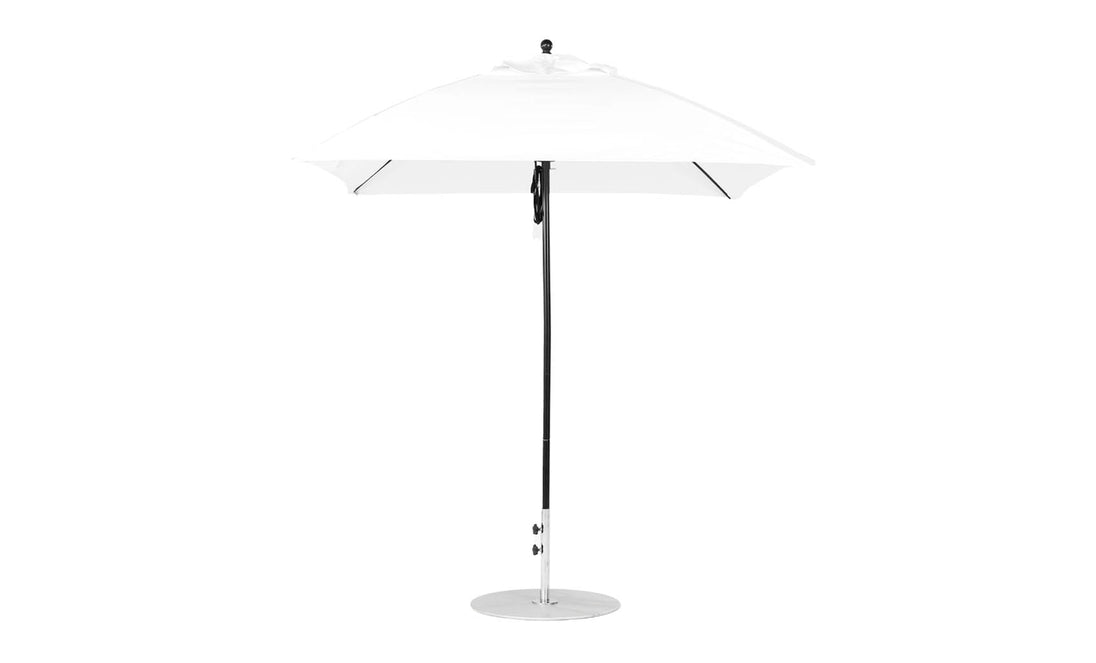 The Ledge Lounger Essential Fiberglass Umbrella, featuring a 7.5’ square pulley design, presents a sleek modern look with a marine-grade fabric canopy on a black pole and round silver base.