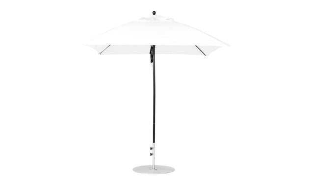 The Ledge Lounger Essential Fiberglass Umbrella, featuring a 7.5’ square pulley design, presents a sleek modern look with a marine-grade fabric canopy on a black pole and round silver base.