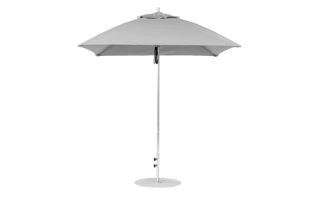 The Ledge Lounger Essential Fiberglass Umbrella, a 7.5 square model with marine-grade fabric and a resilient metal pole stand, is displayed against a plain white background.