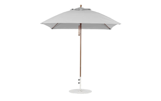 The Ledge Lounger Essential Fiberglass Umbrella - 7.5 Square Pulley, made with marine-grade fabric, features a wooden pole and metal base. Set against a white background, its gray design highlights its simplicity and sturdiness when fully open.