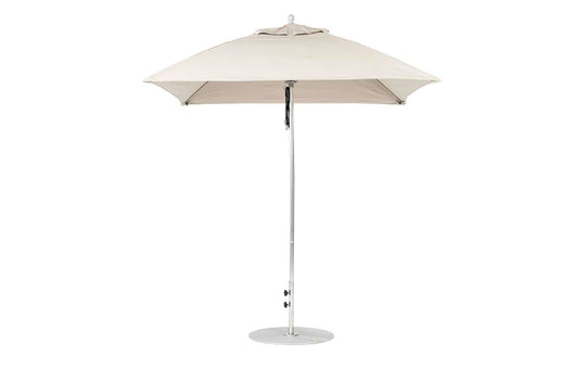 The Ledge Lounger Essential Fiberglass Umbrella, a 7.5 square pulley model in beige, features marine-grade fabrics with a sleek metal pole and round base, standing against a white background. Its modern design enhances any patio setting.