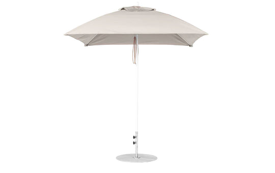 The Ledge Lounger Essential Fiberglass Umbrella - 7.5 features a round canopy crafted from marine-grade fabrics on a sleek metal pole with a circular base, equipped with a tie strap, and is showcased against a plain white background, emphasizing its durability akin to fiberglass umbrellas.