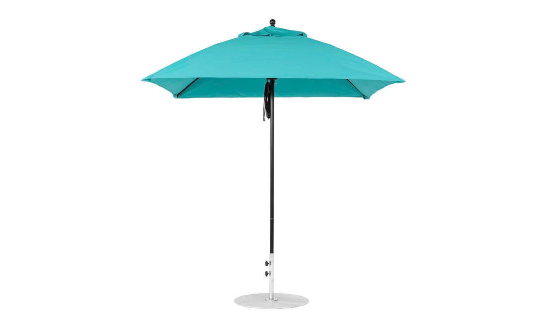 The Ledge Lounger Essential Fiberglass Umbrella features a 7.5 square canopy in turquoise with a metal base and straight pole. Its open design reveals an eight-rib support structure, crafted with marine-grade fabrics for ultimate durability.