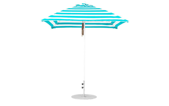 The Ledge Lounger Essential Fiberglass Umbrella features a blue and white stripe, marine-grade fabric, a pointed top with a straight metal pole, and stands securely on a round metallic base.