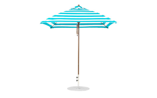 The Ledge Lounger Essential Fiberglass Umbrella - 7.5 Square Pulley features a turquoise and white striped design, a wooden pole with a round base, and is made from durable marine-grade fabrics.