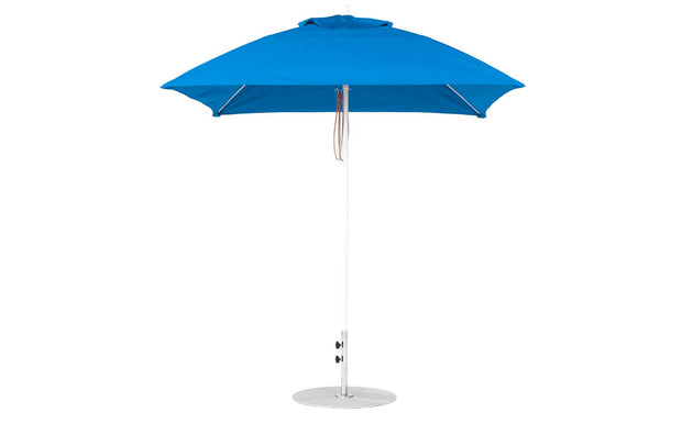 The Ledge Lounger Essential Fiberglass Umbrella features a sleek metal pole, round base, and durable marine-grade fabrics. This blue 7.5 square pulley design is simple yet elegant, providing ample shade for gardens or patios.