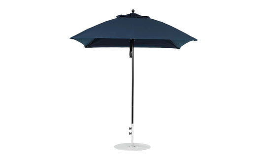 A fully opened Essential Fiberglass Umbrella - 7.5 Square Pulley, by Ledge Lounger, crafted with marine-grade fabrics in dark blue, is supported by a metal pole and round base against a plain white background.