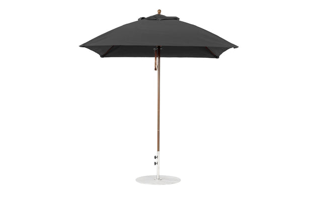 The Ledge Lounger Essential Fiberglass Umbrella - 7.5 Square Pulley stands upright with a sleek, modern design, featuring a durable open canopy crafted from marine-grade fabrics.