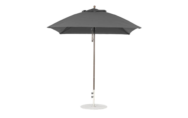 The Ledge Lounger Essential Fiberglass Umbrella - 7.5 Square Pulley is a gray outdoor umbrella featuring a sleek metal pole, smooth circular base, and a round canopy made from marine-grade fabrics, ensuring durability and style against its plain white background.