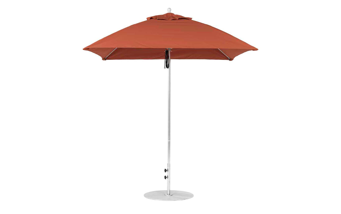 The Ledge Lounger Essential Fiberglass Umbrella, a 7.5-foot square pulley model in red with marine-grade fabric and a metal pole with circular base, is fully opened and elegantly displayed from the front on a white background.