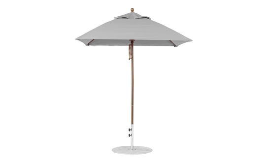 The Ledge Lounger Essential Fiberglass Umbrella - 6.5 Square Pulley features marine-grade fabric and an aluminum center pole, perfect for outdoor use. This large gray umbrella stands open with a circular base, making it ideal for providing shade in gardens or terraces.