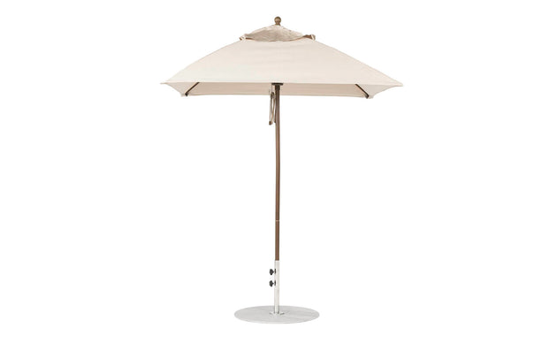 The Ledge Lounger Essential Fiberglass Umbrella - 6.5 Square Pulley showcases a beige marine-grade fabric canopy, an aluminum center pole, and a round metal base, offering ample shade and an elegant decorative finial on top.