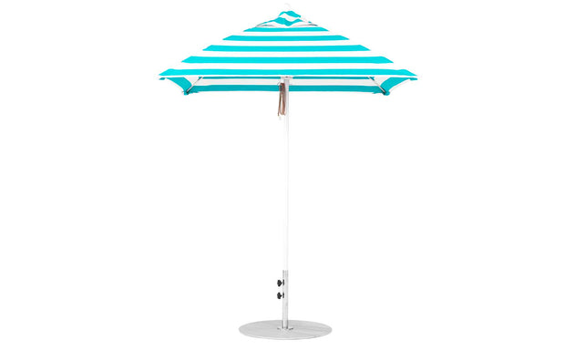 The Essential Fiberglass Umbrella - 6.5 Square Pulley by Ledge Lounger boasts striped turquoise and white marine-grade fabrics, a pointed top, and a flat, circular base with an aluminum center pole for enhanced durability.