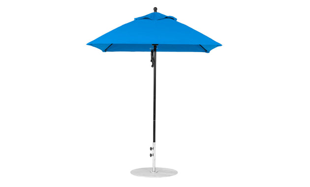 The Ledge Lounger Essential Fiberglass Umbrella - 6.5 Square Pulley in blue features an aluminum center pole and a round, flat metallic base. Its simple yet elegant design uses marine-grade fabrics for all-weather durability.