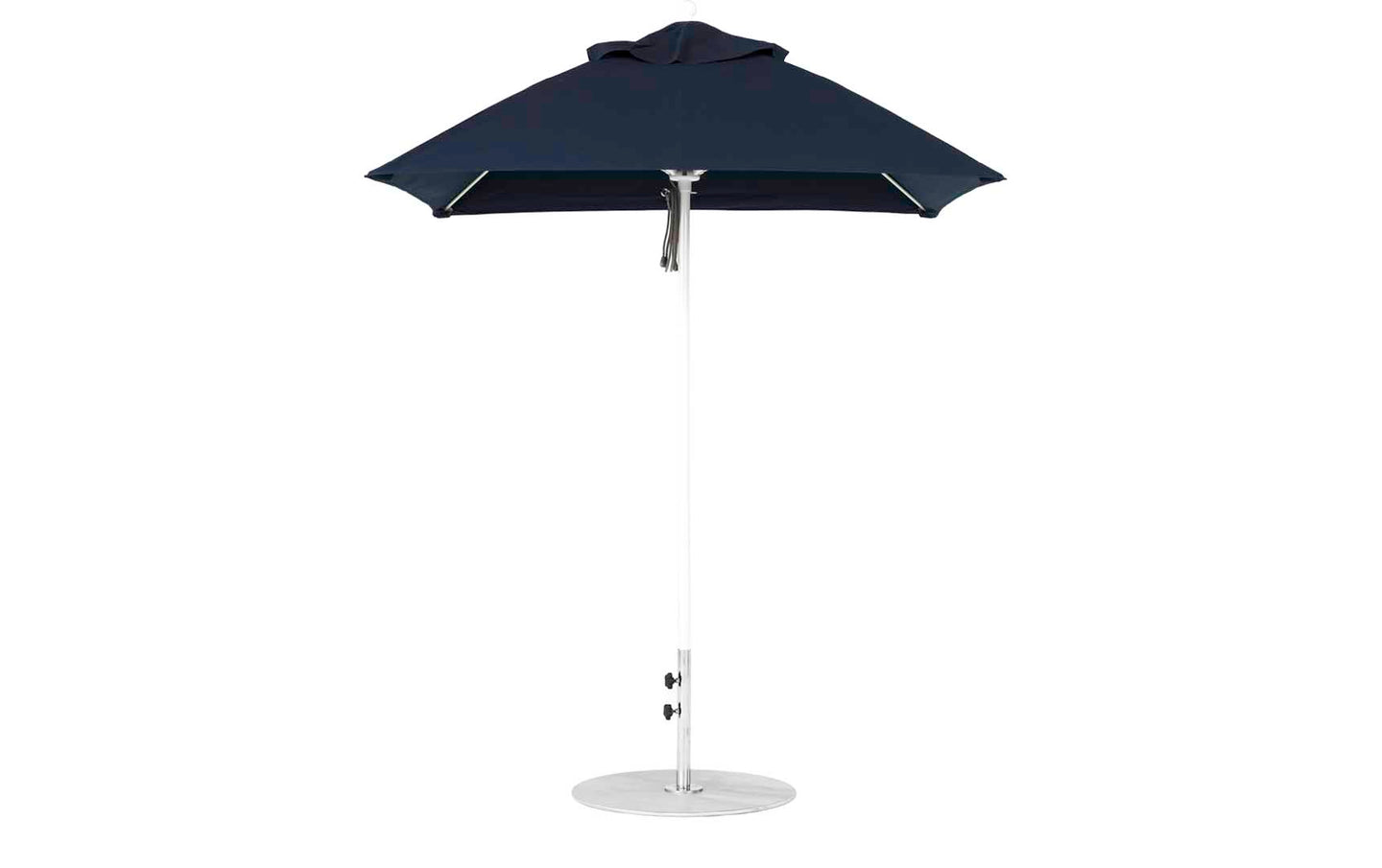 A modern Essential Fiberglass Umbrella by Ledge Lounger features a sleek conical black canopy, an aluminum center pole, and stands on a round base. It boasts durable marine-grade fabrics and a minimalist design.