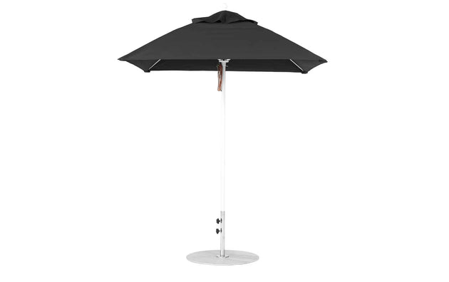 The Ledge Lounger Essential Fiberglass Umbrella, 6.5 Square Pulley has a durable marine-grade fabric canopy, a sleek tall white pole with an aluminum center pole, and a round metal stand for stability.