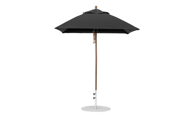 The Essential Fiberglass Umbrella by Ledge Lounger is a black 6.5 square umbrella made with marine-grade fabric and a wooden pole, featuring a round metal base and a top finial, isolated on a white background.