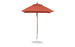 A red Essential Fiberglass Umbrella by Ledge Lounger, with a wooden pole and circular gray base, stands open. Its 6.5 square canopy is crafted from marine-grade fabrics for enhanced durability outdoors.