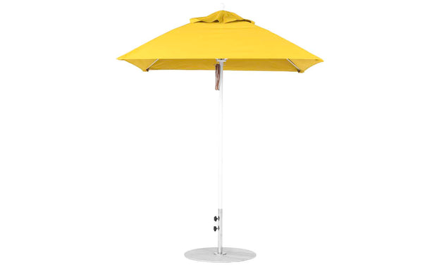 The Ledge Lounger Essential Fiberglass Umbrella - 6.5 Square Pulley is a standalone yellow umbrella featuring an aluminum center pole and silver base. Its durable marine-grade fabrics ensure lasting quality, providing perfect shade for patios or gardens with its simple design.