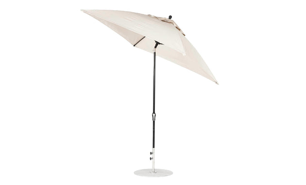 The Ledge Lounger Essential Fiberglass Umbrella - 7.5 Square Crank Auto Tilt showcases a beige marine-grade fabric canopy, supported by a sturdy metal pole and circular base. Corrosion-resistant, it is elegantly presented against a plain white background.