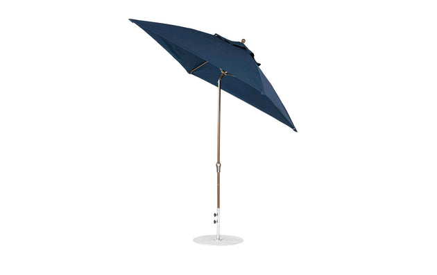 The Ledge Lounger Essential Fiberglass Umbrella, featuring a 7.5 square navy blue canopy and crank auto tilt, combines marine-grade fabrics and corrosion-resistant durability with a metal pole and circular base for style and stable shade.