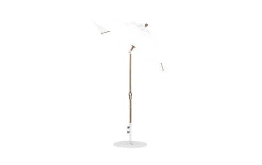 The Essential Fiberglass Umbrella by Ledge Lounger, a 6.5 square model with an auto tilt crank, features a white design with a wooden pole and metal base, crafted from corrosion-resistant materials and durable marine-grade fabrics, showcased against a plain white background.