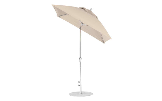 The Ledge Lounger Essential Fiberglass Umbrella, 6.5 square with a crank auto-tilt mechanism, features a beige marine-grade fabric canopy and silver pole on a circular base. Its corrosion-resistant design ensures durability for outdoor use.