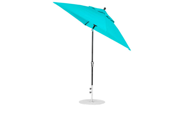 A turquoise Ledge Lounger Essential Fiberglass Umbrella features a metal pole on a circular base. Made from corrosion-resistant materials and marine-grade fabrics, the 6.5 square crank auto tilt umbrella is partially opened, highlighting its vibrant color against a plain white backdrop.