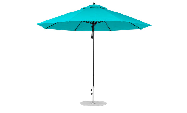 The Ledge Lounger Essential Fiberglass Umbrella is an 11 octagon pulley design crafted in turquoise marine-grade fabric with a sleek black pole and round base. Its wide canopy with a wind vent offers ample shade and exceptional wind resistance, making it the ideal patio umbrella choice.