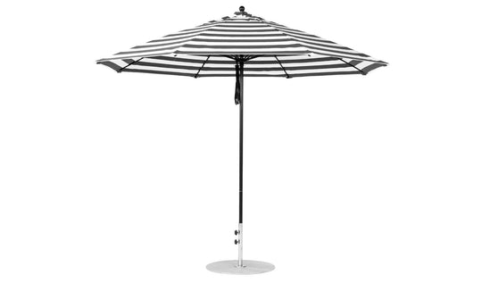The Essential Fiberglass Umbrella - 11 Octagon Pulley by Ledge Lounger features a durable black and white striped design made from marine-grade fabrics.