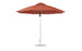 The Essential Fiberglass Umbrella by Ledge Lounger features an 11 octagon canopy made of marine-grade fabrics, standing on a circular base with a metal pole. This large, brown patio umbrella is open and wind-resistant, perfect for providing outdoor shade.