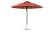 The Essential Fiberglass Umbrella - 11 Octagon Pulley by Ledge Lounger is a large, rust-colored patio umbrella with a sleek black pole and round metal base, made from marine-grade fabrics and fully open for side viewing.