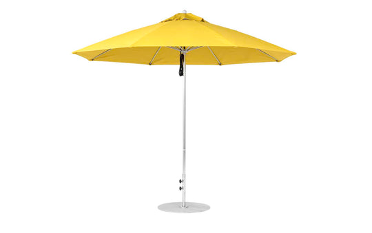 A lime green Essential Fiberglass Umbrella by Ledge Lounger, featuring an 11 octagon canopy made from marine-grade fabrics and a silver metal pole on a circular base, isolated against a white background.