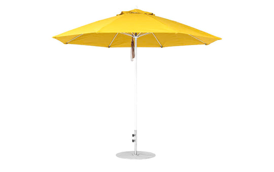 The Essential Fiberglass Umbrella by Ledge Lounger is a fully opened, wind-resistant, large yellow patio umbrella with an 11 octagon canopy, made from marine-grade fabrics. It features a white pole and round metal base against a plain white background.