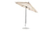 The open 9 beige Ledge Lounger Essential Fiberglass Umbrella, boasting marine-grade fabric and a central black pole, stands on a round metal base with its ribs and canopy slightly tilted against a white backdrop.
